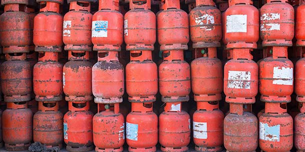 Stack of old gas cylinders for recycling